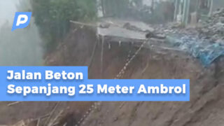 Jalan Beton di Lumbang Ambrol Pasca Diguyur Hujan 5 Jam